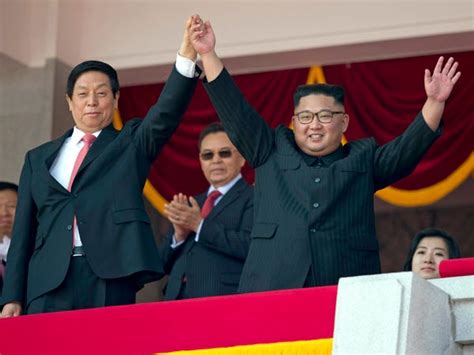 North Korea Stages Military Parade Without Advanced Missiles For 70th