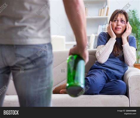 drunk husband abusing wife  domestic violence concept image stock