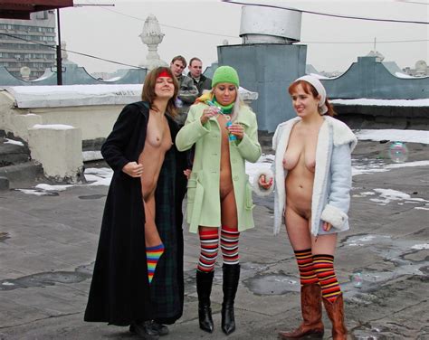 three russian girls in bright socks posing naked on roof russian sexy girls