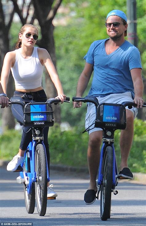 Leonardo Dicaprio Takes A Bike Ride With Mystery Blonde In