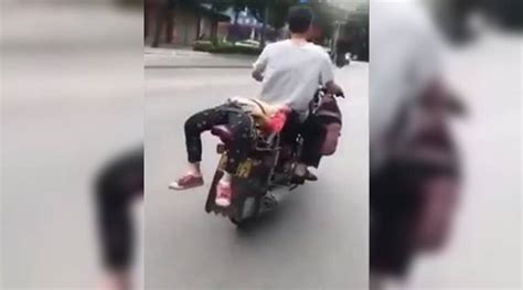 video father ties daughter on his bike as she refuses to go to school the indian express