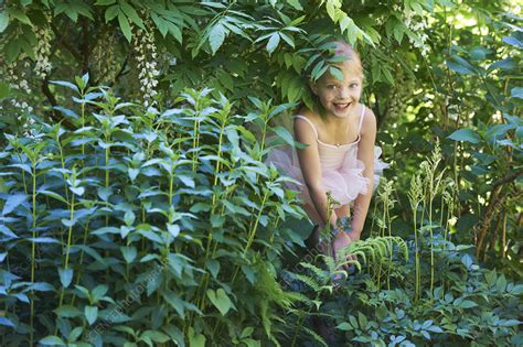 Girl In Ballet Costume Hiding In Bush Stock Image F004 2027