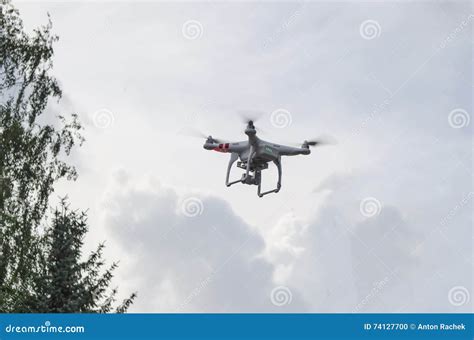 drone   blue sky flying stock photo image  spin drone