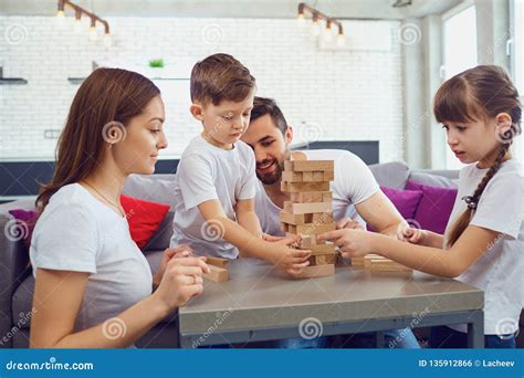 happy family playing board games  home stock photo image  play