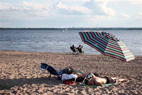 people sleeping   beach quebec editorial photography image