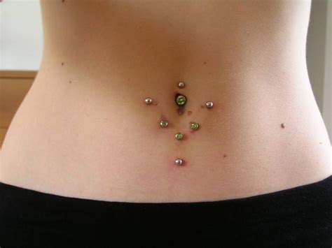 belly button piercing aftercare  infected navel piercing symptoms