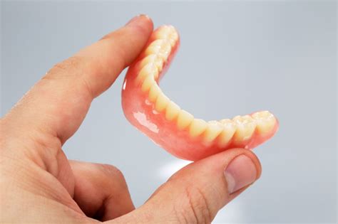 adjusting   affordable  dentures  temporary loss  taste
