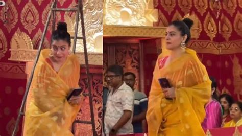 Kajol Devgan झिलमिलाती पीली साड़ी पहने मां दुर्गा का आशीर्वाद लेने