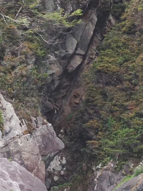 ancient giant face discovered   cliff  canada hidden  plain sight video