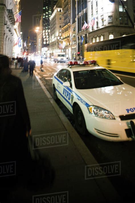 police car parked  busy street stock photo dissolve