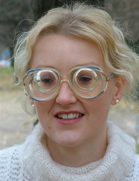hot blonde girl with glasses wearing oversized vintage glasses with