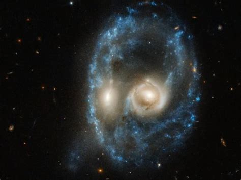 galaxies  collision  forms spooky face staring   earth