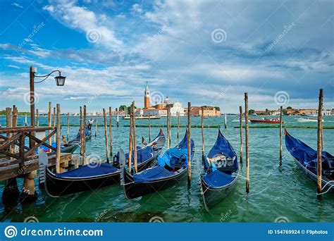 Gondolas And In Lagoon Of Venice By Saint Mark San Marco