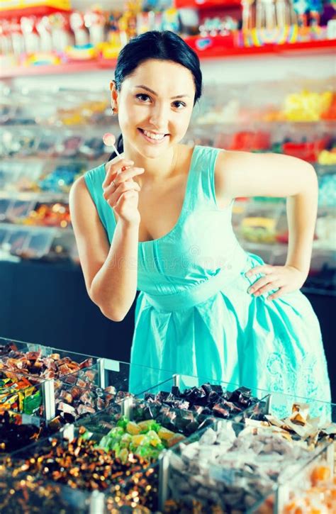 Pleased Female Posing In The Store With Lolly Stock Image Image Of
