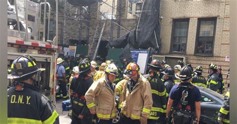 fdny partial bronx building collapse kills  person firefighters