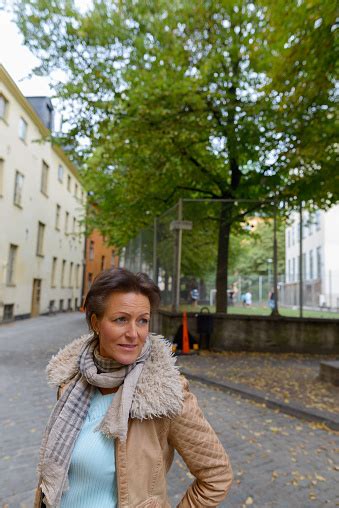 Mature Beautiful Tourist Woman Exploring The City Of Stockholm Sweden