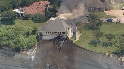 Photos Homeowner Torches House Teetering On Lake Cliff In