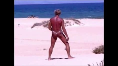 Tanned Guy On Beach In Tiny String Thong Temporarily