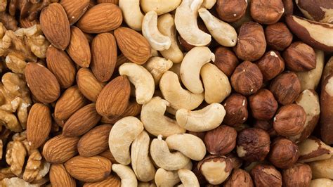 just a handful of nuts may help keep us from packing on the pounds as we age mpr news