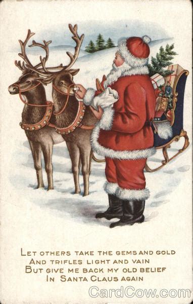 santa feeding reindeer santa claus