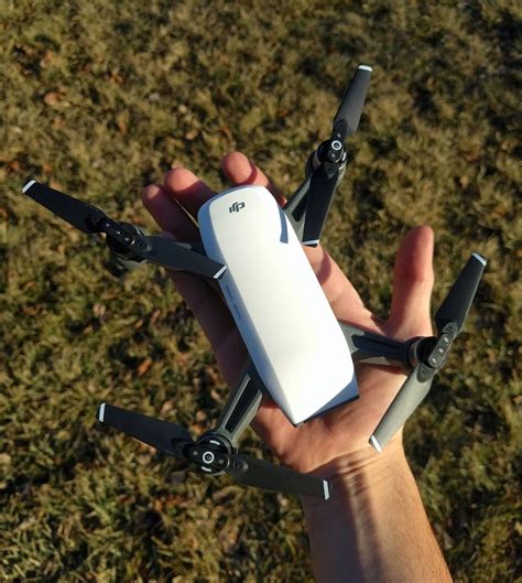 drone review   dji spark  companion drone  cyclist
