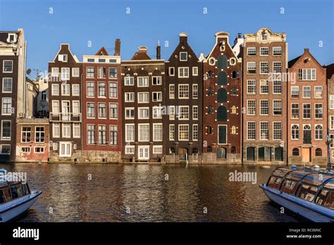 tall dutch houses overlooking  canal  amsterdam  houses   called