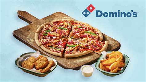 dominos uk  launching  meaty vegan pizza  nuggets livekindly