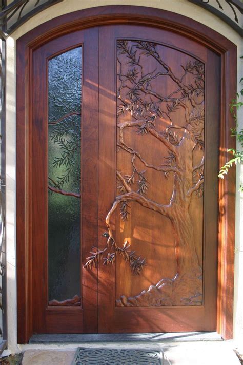 exceptional beautiful wood door  carved tree