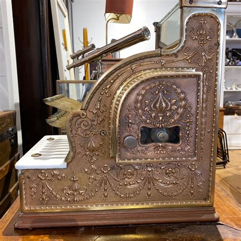 sold antique national cash register model   gold finish