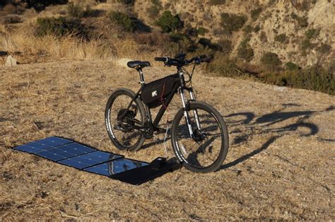 power cycles ht  electric bike  portable solar charger harnessing  power   sun