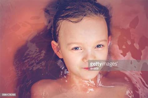 Young Girl Underwater In Bathtub Photos And Premium High Res Pictures