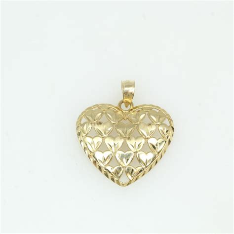 kt gold  heart shaped pendant property room