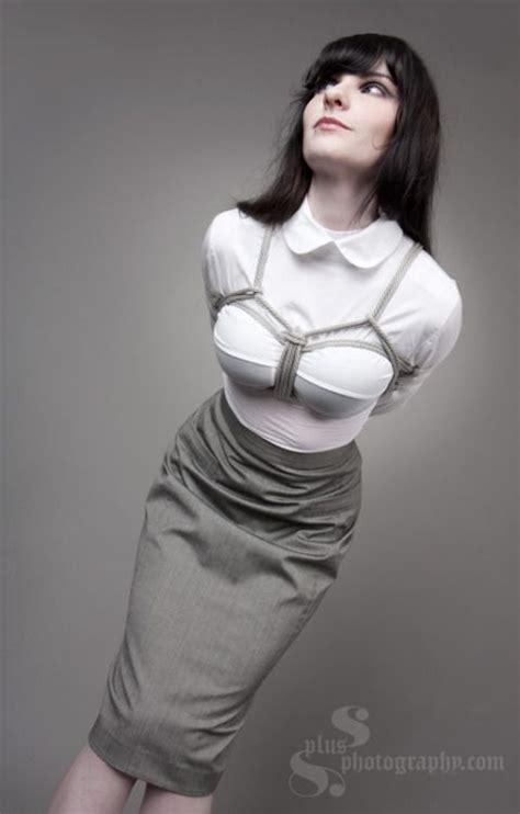 Ninh Pencil Skirt And A Tight White Blouse Enhanced By