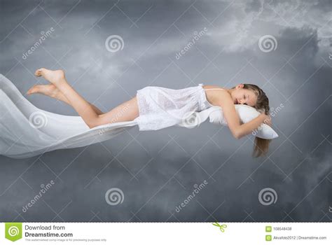 Sleeping Girl Flying In A Dream Clouds On Grey