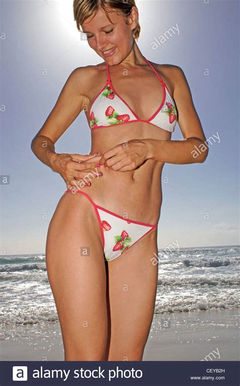 Female Short Blonde Hair White Bikini With Red Edging