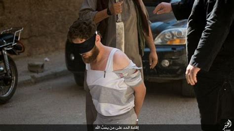 isis thugs behead blindfolded man and crucify his corpse in barbaric