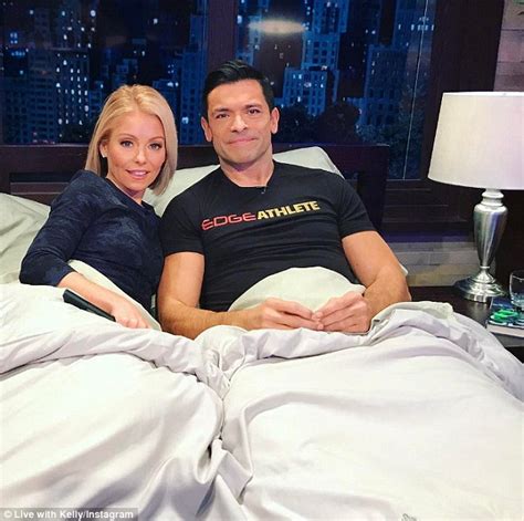 kelly ripa says her husband is now overcompensating in bed daily mail