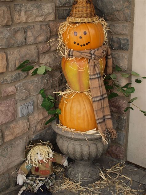 pumpkin scarecrowon  front porch fall thanksgiving pumpkin