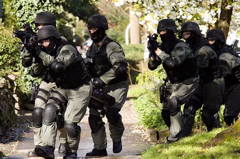 swat raids soldiers home  dhs agent mistook  air rifle   ar  infinite unknown