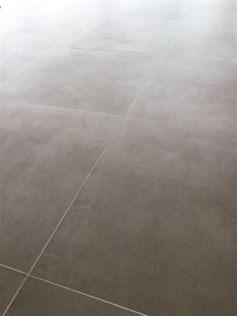 douglas en jones beton grijs  cm grey tiles living room bar interior design helga