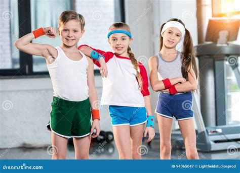 adorable kids  sportswear smiling  posing  fitness studio stock image image  sportive