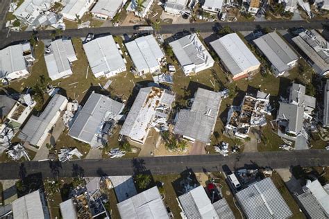 badly damaged mobile homes  hurricane ian  florida residential area consequences