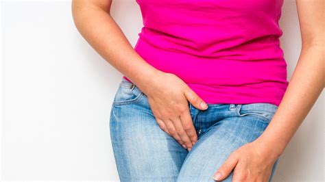 what happens to your body when you hold your pee