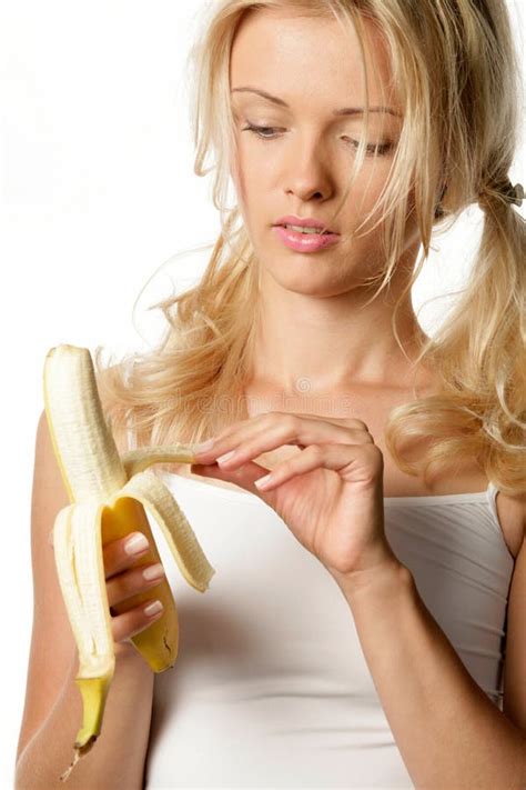 the blonde imitates oral sex and sucks a banana stock image image of