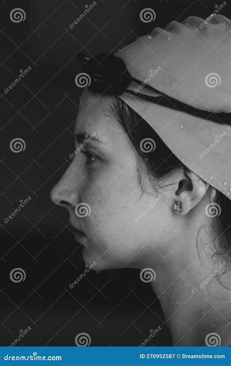 Extreme Close Up Shot Of A Caucasian Girl Head With A Swimming Cap And