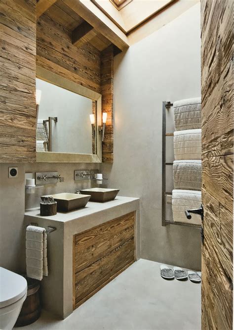 bathroom   sinks  toilet   wooden paneled wall