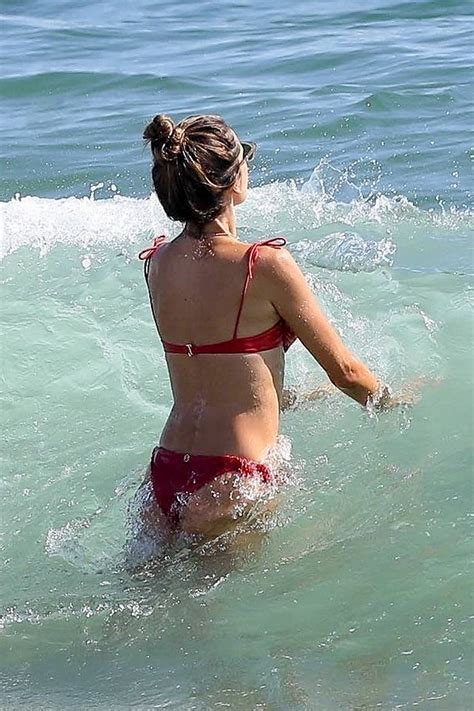 Alessandra Ambrosio In A Micro Bikini On The Beach With A Busty