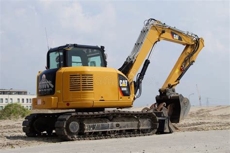 caterpillar  mini hydraulic excavator editorial photo image