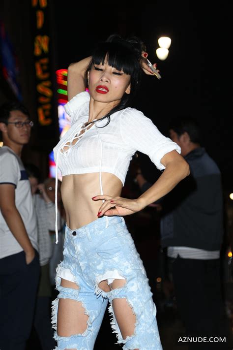 bai ling braless in a white top and ripped jeans in los angeles aznude