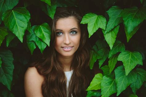women model face portrait smiling leaves brunette long hair